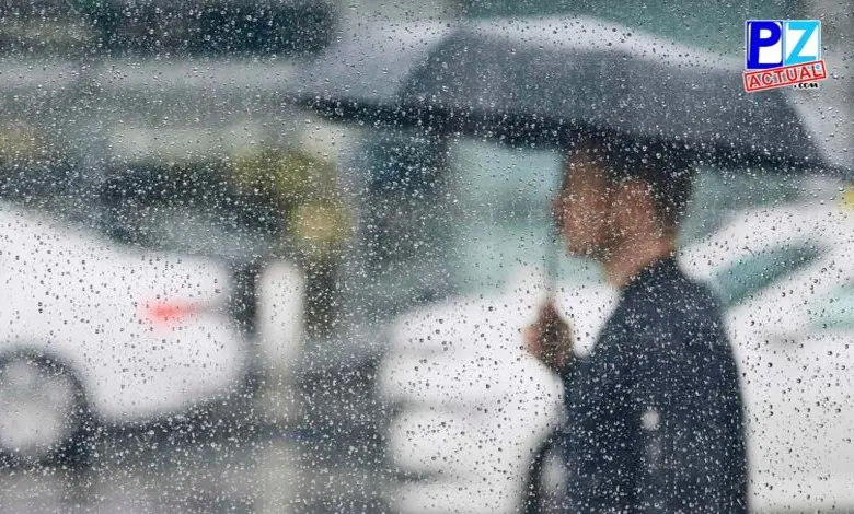 Imagen muestra lluvias y paraguas
